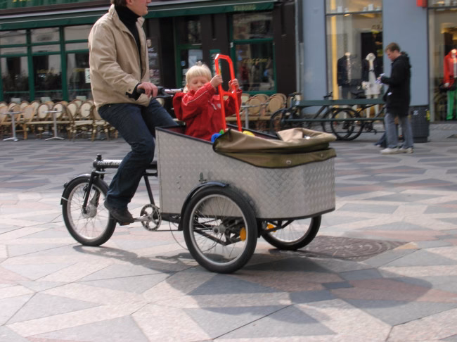 Why do people ride bikes in Denmark?