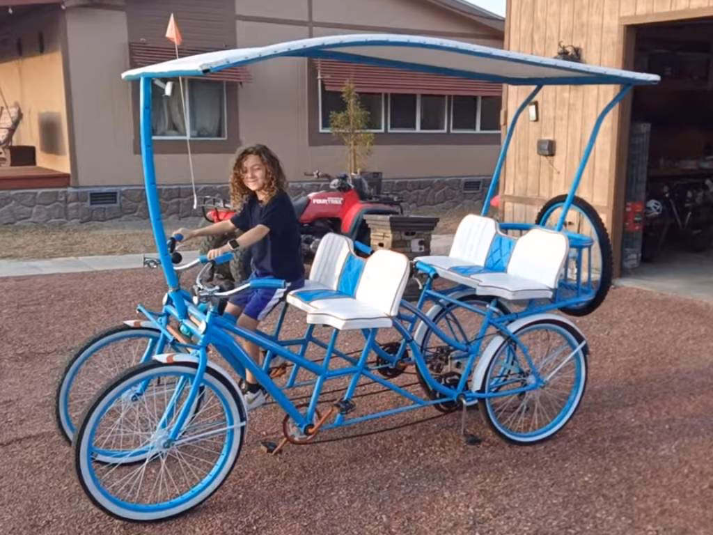 ¿Cómo se llama la bicicleta de 4 ruedas?